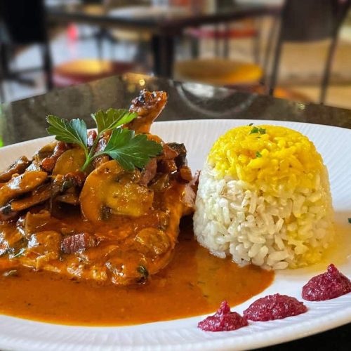 portofino-italian-restaurant-newcastle-main A meat dish with rice served at Portofino restaurnat in Newcastle